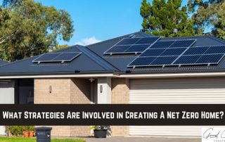 Modern house with solar panels on the roof, surrounded by trees, with the text What Strategies Are Involved in Creating a Net Zero Home? across the image.