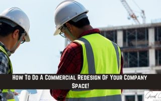 Two construction workers in safety gear review plans at a building site, with a partially constructed commercial building visible in the background.