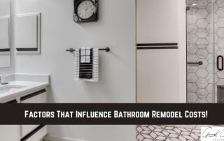 Modern bathroom featuring a white vanity, mirror, towel rack, and a glass shower with hexagonal tile. Text overlay reads: Factors That Influence Bathroom Remodel Costs!.